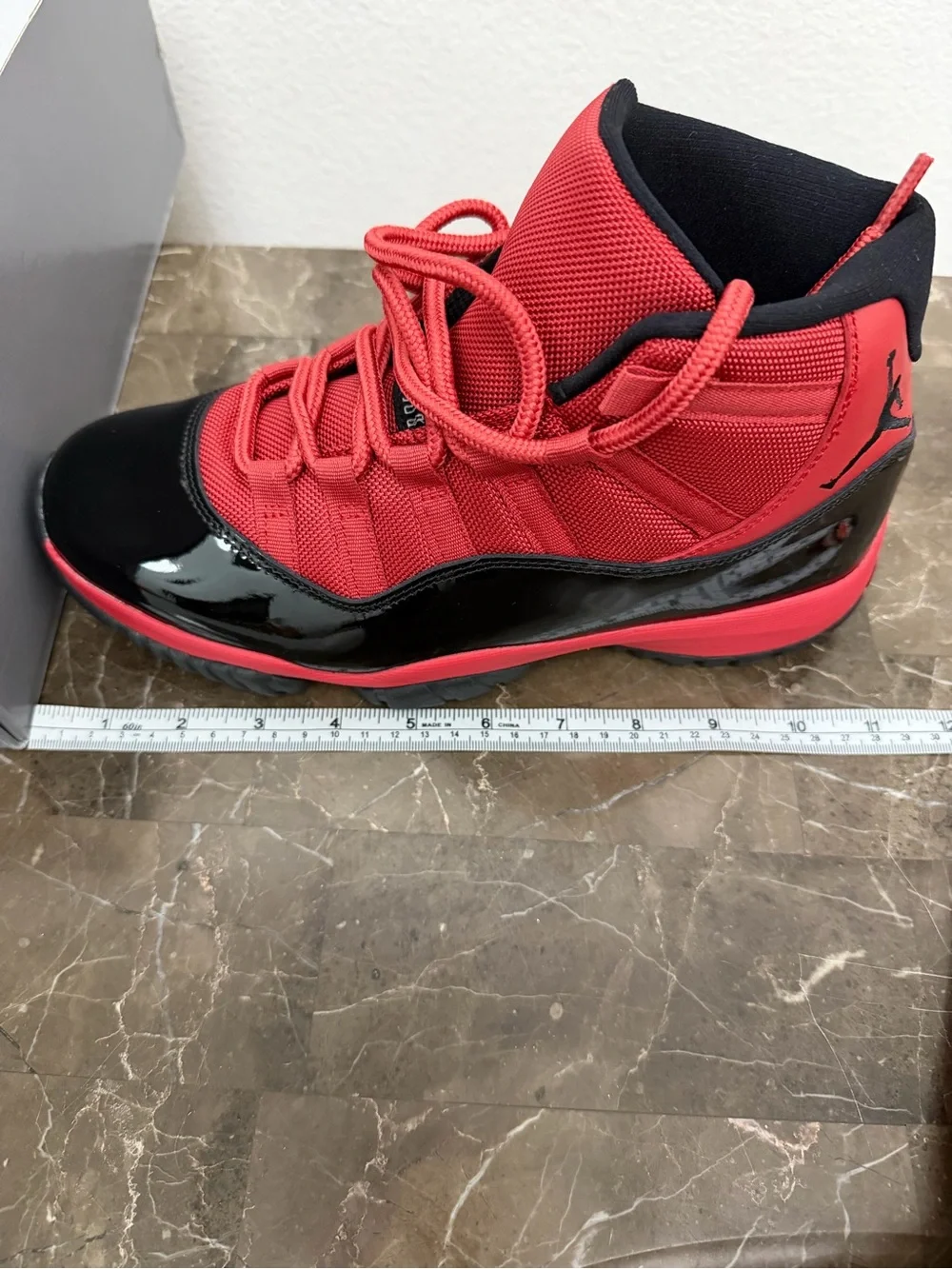 New! Unworn! Air Jordan 11 retro red and black men’s size 8
